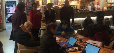 Attendees co-creating poetry with a machine-learning algorithm