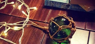 A glass buoy and fairy lights